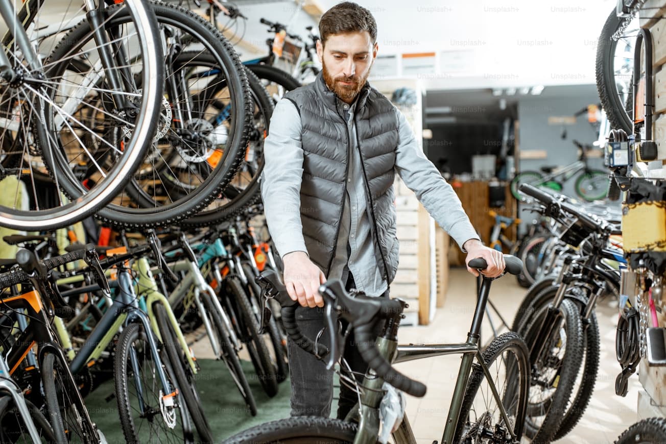 Cyclist choosing a repair workshop
